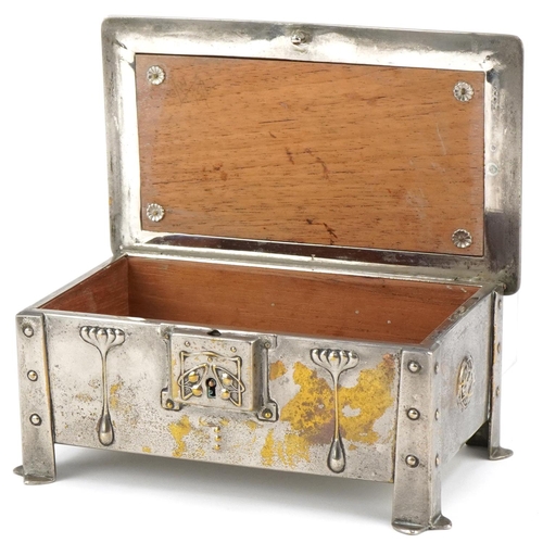 70 - Arts & Crafts silver plated casket with stylized floral enamel panel, 7cm H x 18cm W x 10cm D