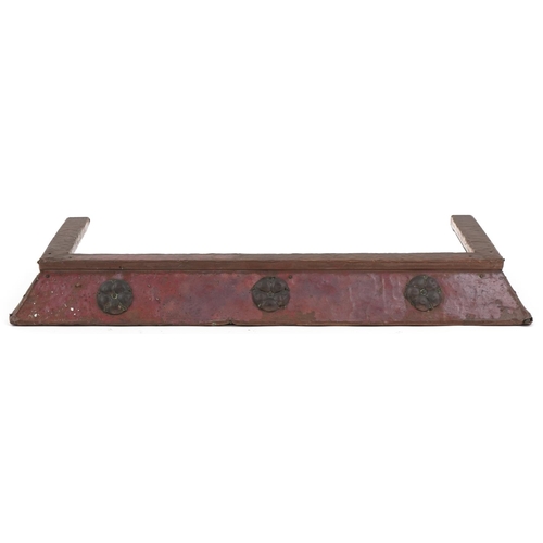 159 - Arts & Crafts copper and wooden fender with stylized rosettes, 8cm H x 68cm W x 28cm D