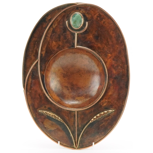 406 - Sam Fanaroff copper stylized dish inset with a cabochon stone, impressed SF, 37cm in diameter