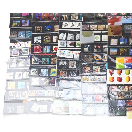 1359 - Extensive collection of Royal Mint presentation packs, various genres and denominations