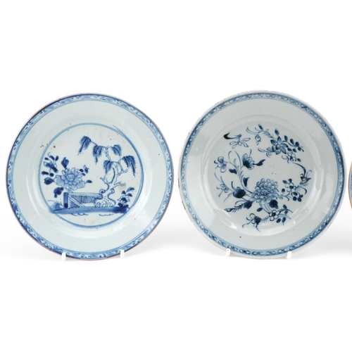 1110 - Three 18th century hand painted blue and white plates, two in the Willow pattern, one with flowers, ... 