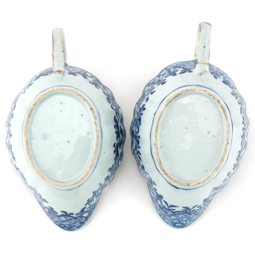 1205 - Pair of 18th century Chinese porcelain sauce boats hand painted in the Willow pattern, each 20cm in ... 