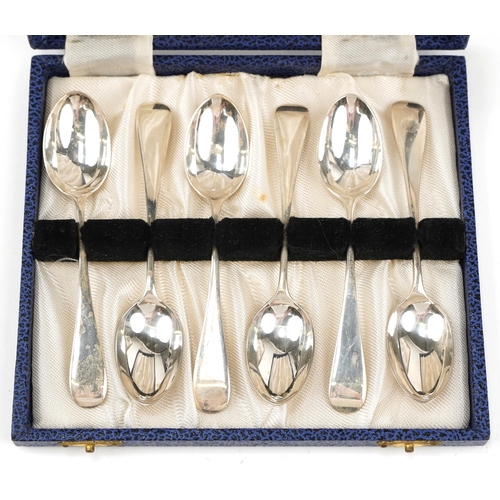 1342 - Two sets of six silver teaspoons with fitted cases including a set of six golfing interest, the larg... 