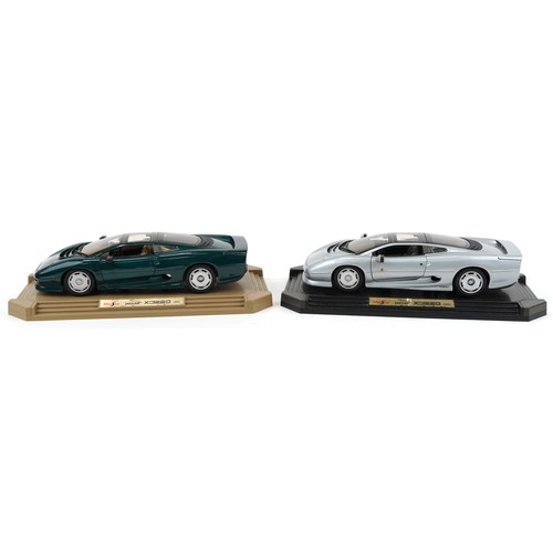 2324 - Two Maisto Jaguar XJ220 1:12 scale diecast vehicles on display stands,