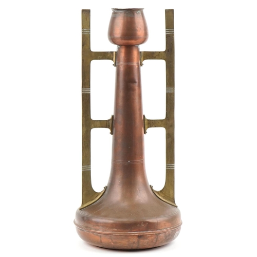 493 - Arts & Crafts stylized copper vase with brass handles, 55cm high