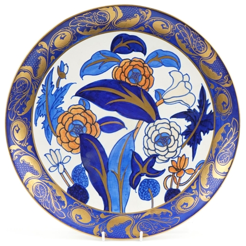 295 - Charlotte Rhead for Wood & Sons stylized floral charger, numbered 1420 to the reverse, 41cm in diame... 