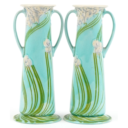 190 - Pair of Minton Secessionist vases with stylized flowers, each 29cm high