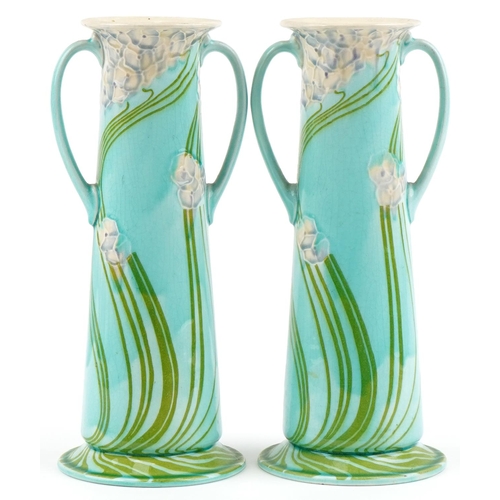 190 - Pair of Minton Secessionist vases with stylized flowers, each 29cm high