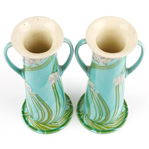 190 - Pair of Minton Secessionist vases with stylized flowers, each 29cm high