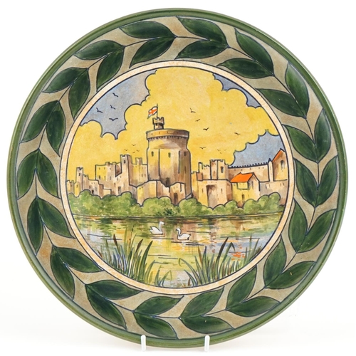 393 - Harold Bennett for Burleigh Ware castle design wall plate, 35cm in diameter