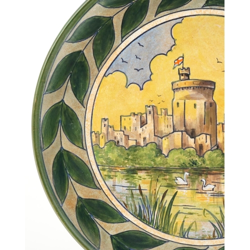 393 - Harold Bennett for Burleigh Ware castle design wall plate, 35cm in diameter