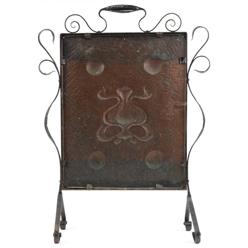 37 - Arts & Crafts copper and wrought iron fire screen  in the manner of Liberty's decorated with a styli... 