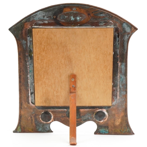 31 - Arts & Crafts Liberty style copper easel framed mirror set with enamelled cabochons, 53cm x 50cm