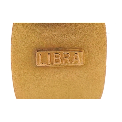 3135 - Yellow metal Libra zodiac pendant on a yellow metal necklace, indistinct marks to the clasp, 2.5cm h... 