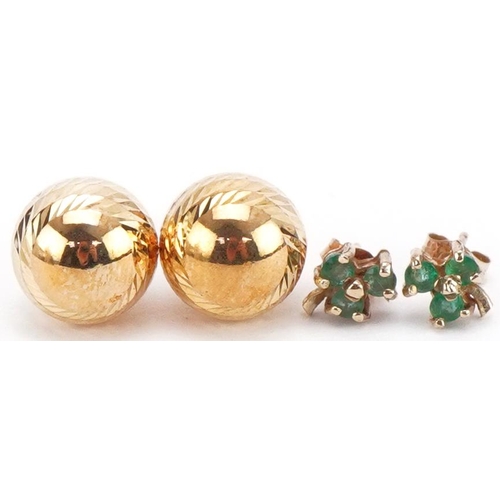 3407 - Two pairs of 9ct gold earrings including pair set with emeralds, the largest 10mm in diameter, total... 