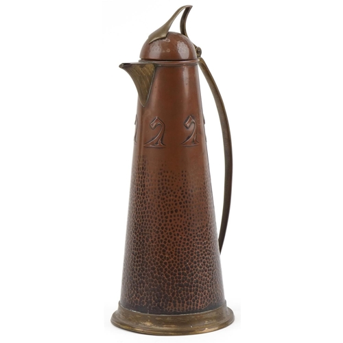 491 - Jugendstil Arts & Crafts copper and brass claret jug, 37cm high