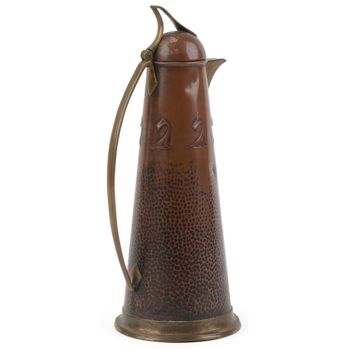 491 - Jugendstil Arts & Crafts copper and brass claret jug, 37cm high