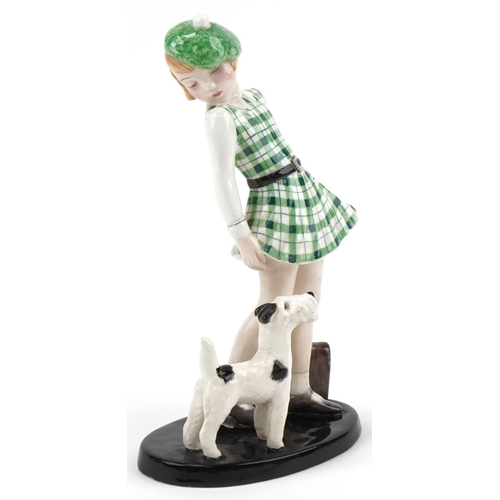 463 - Goldschneider Claire Weiss figurine of a girl with her Terrier, impressed number 7274 to the base, 2... 