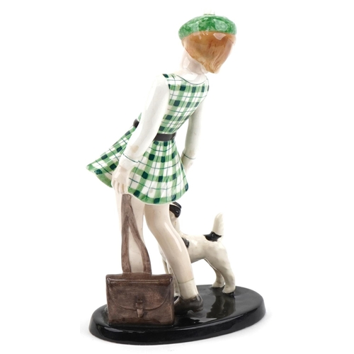 463 - Goldschneider Claire Weiss figurine of a girl with her Terrier, impressed number 7274 to the base, 2... 