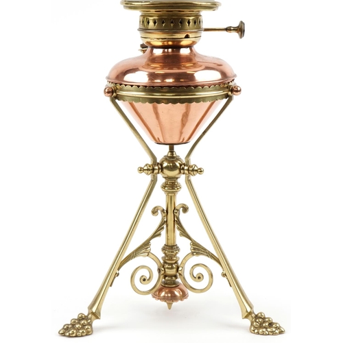 25 - Arts & Crafts  copper and brass oil lamp with etched glass shade in the style of W.A.S Benson, 63cm ... 