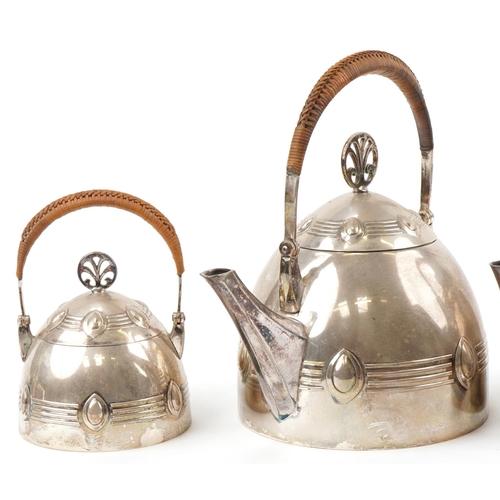 483 - WMF stylized four piece silver plated tea set with wicker handles, the largest piece 25cm high