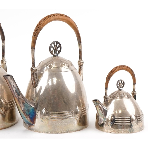 483 - WMF stylized four piece silver plated tea set with wicker handles, the largest piece 25cm high