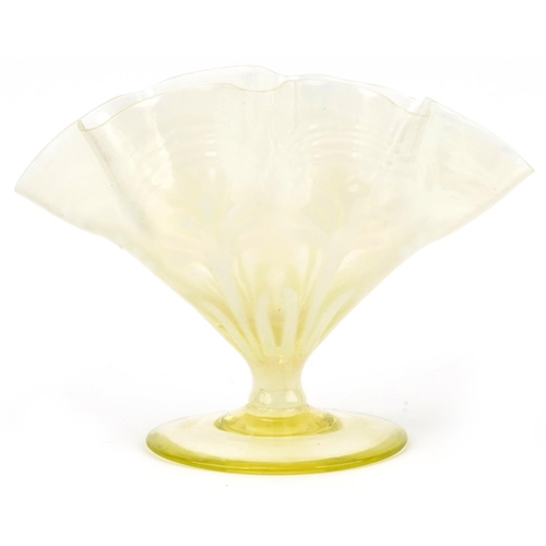 282 - Vaseline glass vase on a stemmed base, 16cm high