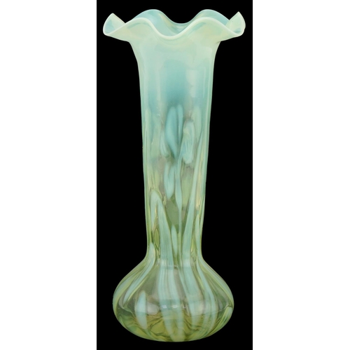 278 - Vaseline glass lily design vase, 32cm high