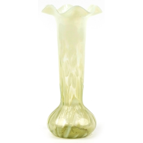 278 - Vaseline glass lily design vase, 32cm high