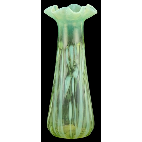 279 - Vaseline glass lily design vase, 26cm high