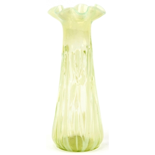 279 - Vaseline glass lily design vase, 26cm high