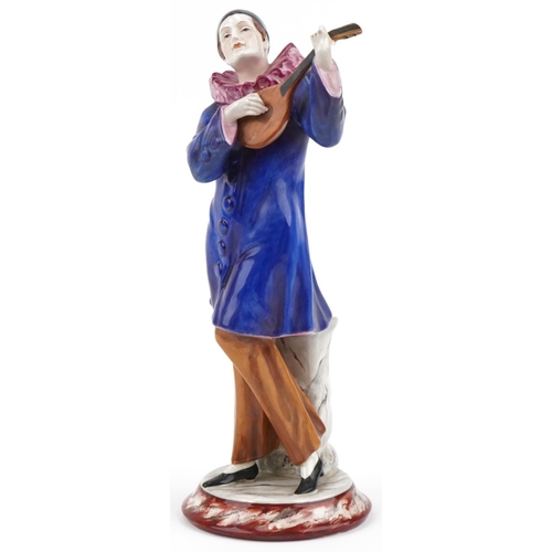 472 - Royal Dux Czechoslovakia figure of a mandolin player, numbered 2734 to the base, 32cm high