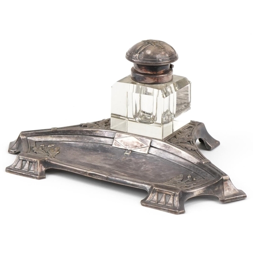 495 - WMF style silver plated ink stand with cut glass bottle, decorated with acorns, 21cm in diameter