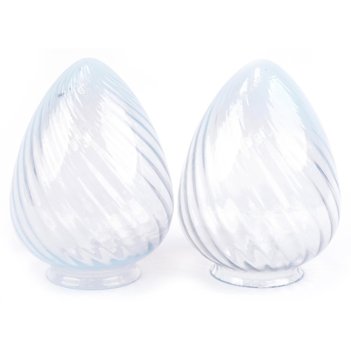 97 - Pair of spiral twist Vaseline glass lampshades, each 19cm high