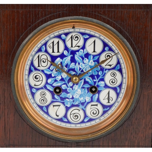 160 - Arts & Crafts oak mantle clock inset with floral enamelled porcelain tiles, the French movement stri... 