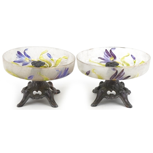 512 - Pair of Art Nouveau pewter and glass tazzas hand painted with lilies, 21cm in diameter