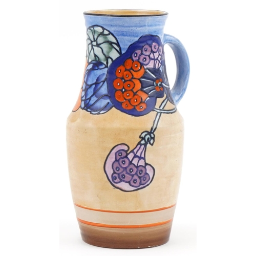 303 - Charlotte Rhead for Bursley Ware pottery jug with stylized flowers, numbered 1987 to the base, 27cm ... 