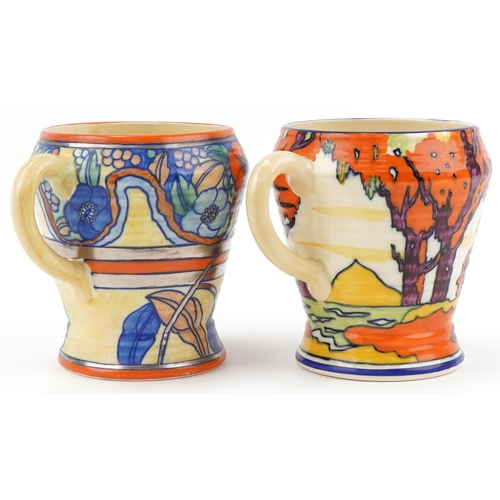 322 - Two Charlotte Rhead for Wardle Swansea Ware Rembrandt pattern floral jugs, each 16cm high