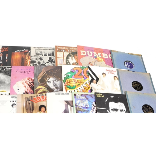 1469 - Vinyl LP records including The Beatles, Madonna, The Police, Simon & Garfunkel, Whitney Houston, Eur... 