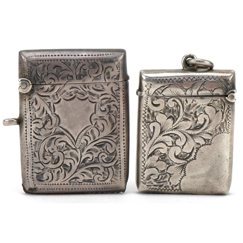 1244 - Two Edwardian and later silver vestas with engraved floral decoration, the largest 4.2cm high, total... 