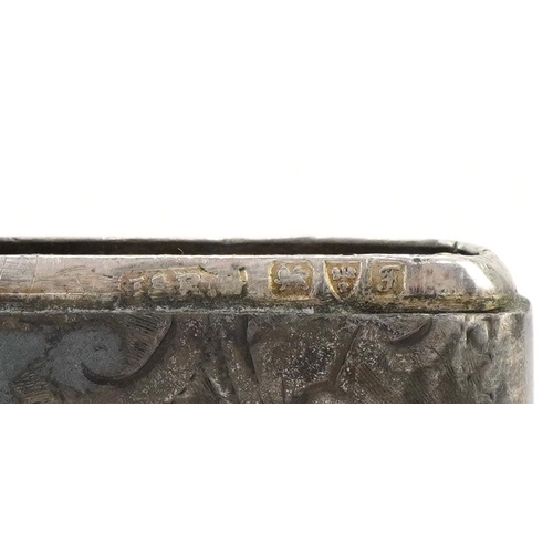 1244 - Two Edwardian and later silver vestas with engraved floral decoration, the largest 4.2cm high, total... 