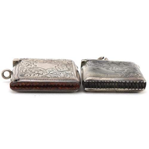 1244 - Two Edwardian and later silver vestas with engraved floral decoration, the largest 4.2cm high, total... 