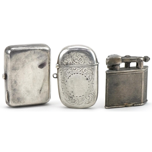 1132 - Objects including Victorian silver vesta and a silver engine turned pocket lighter, the largest 5cm ... 