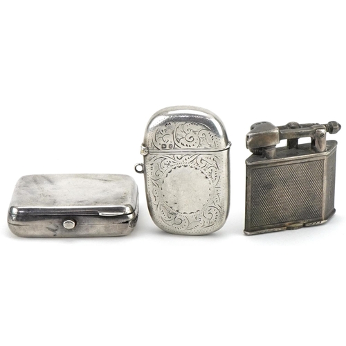 1132 - Objects including Victorian silver vesta and a silver engine turned pocket lighter, the largest 5cm ... 