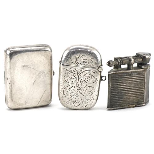 1132 - Objects including Victorian silver vesta and a silver engine turned pocket lighter, the largest 5cm ... 