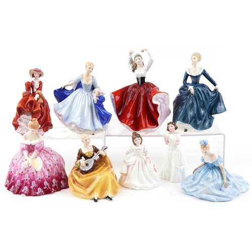 2114 - Nine Royal Doulton figurines including Karen HN2388, Top of the Hill HN4778 and Victoria HN2471, the... 