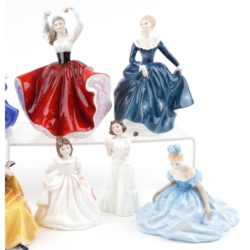 2114 - Nine Royal Doulton figurines including Karen HN2388, Top of the Hill HN4778 and Victoria HN2471, the... 