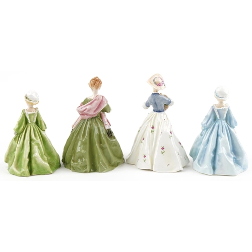 2102 - Four Royal Worcester porcelain figurines comprising First Dance 3629, Grandmother's Dress 3081, Gran... 