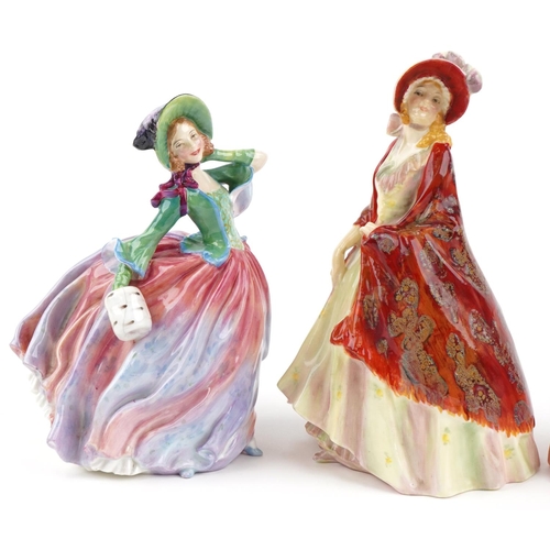 2113 - Four Royal Doulton porcelain figurines comprising Autumn Breezes HN1911, Afternoon Tea HN1747, Maure... 