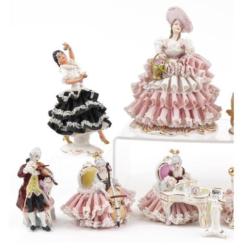 2116 - Ten Dresden porcelain lace figurines and musicians, the largest 18.5cm high